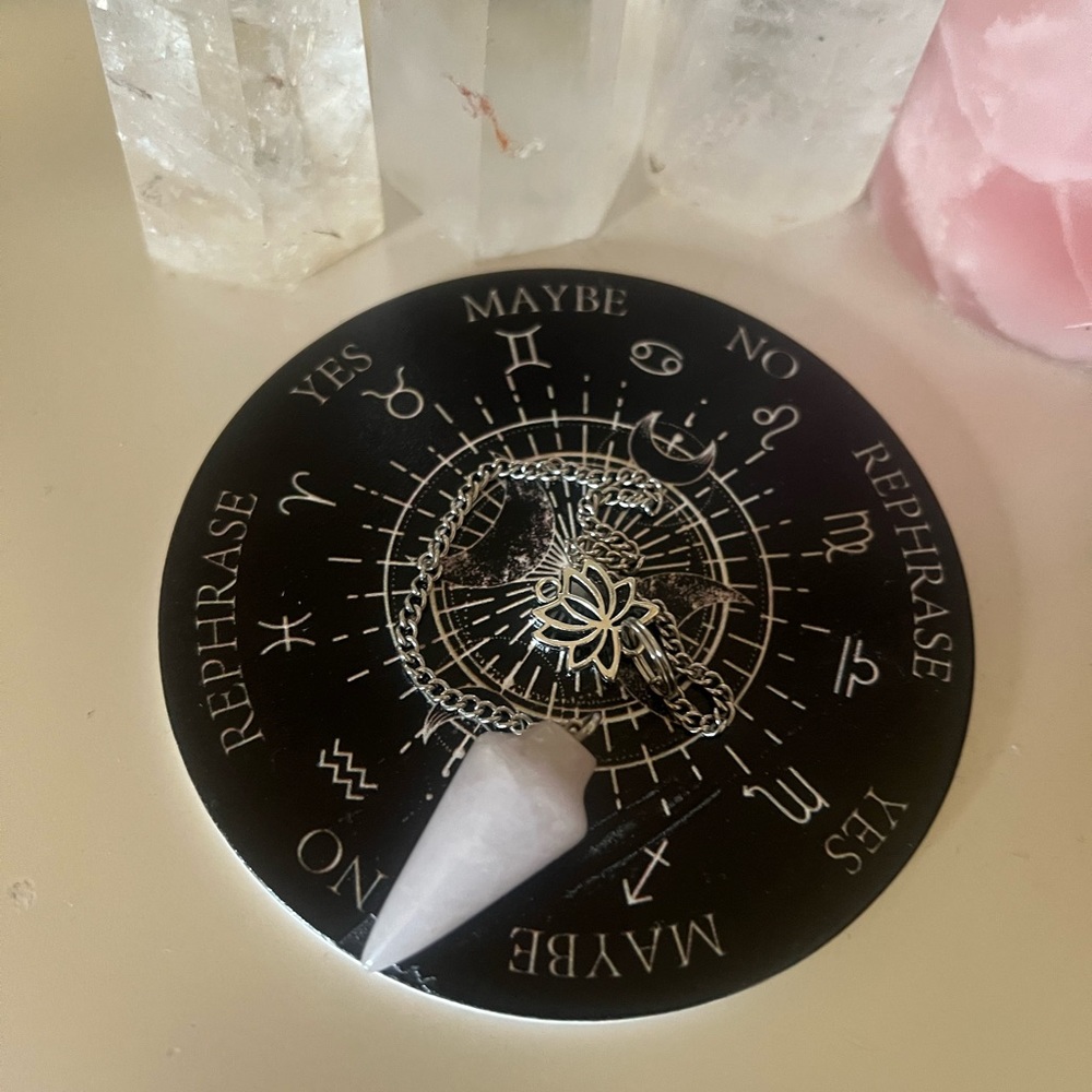 Snow quart crystal pendulum with wooden board